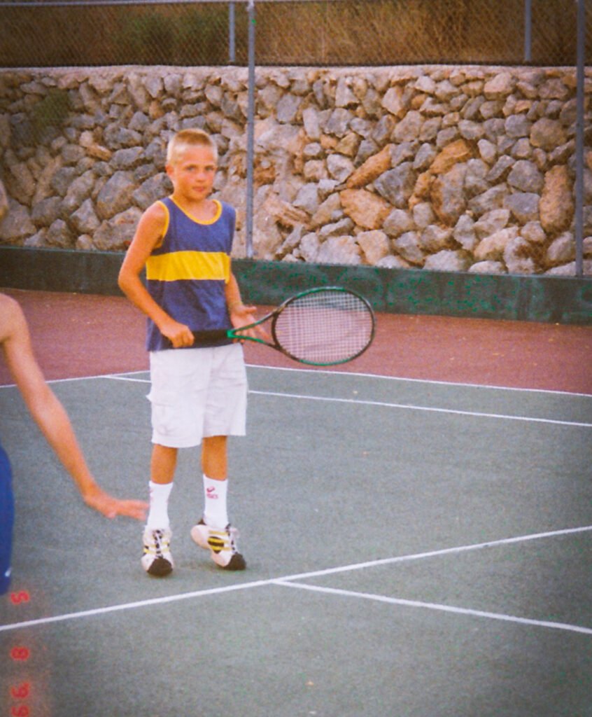 Jannis as a child playing tennis